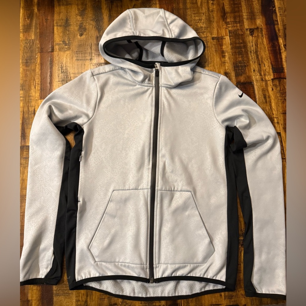 Nike Therma Fit Sz Small women’s jacket. Gray black zip up with 3 pockets hood